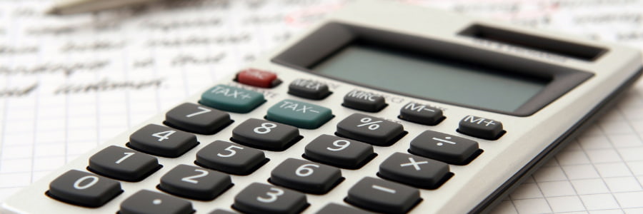 Calculator on a sheet of paper.